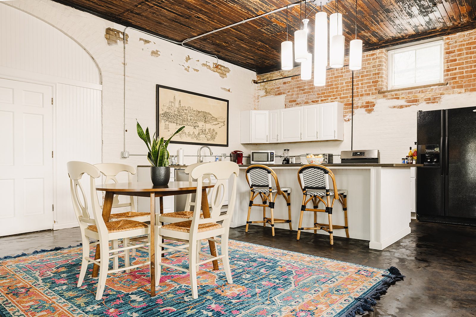 The Carriage House Loft — Dining area and kitchen